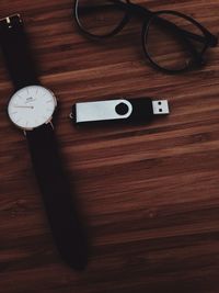 High angle view of clock on table