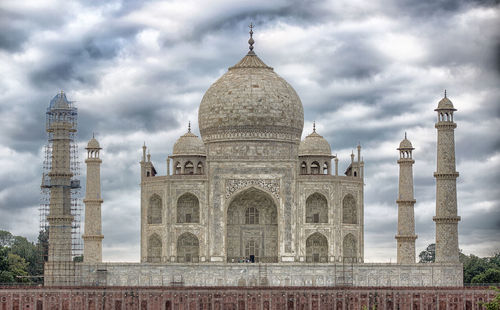 View of historical building against cloudy sky