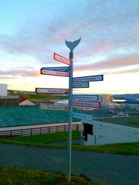 View of road sign against sky