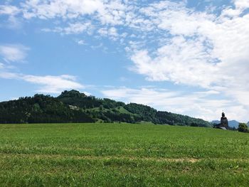 Scenic view of field against sky