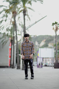 Full length of man standing on street