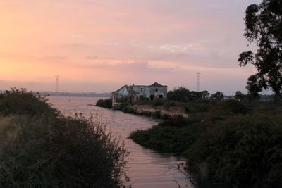 Scenic view of river during sunset