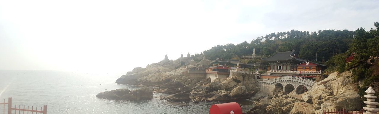 PANORAMIC VIEW OF BUILDINGS AGAINST CLEAR SKY