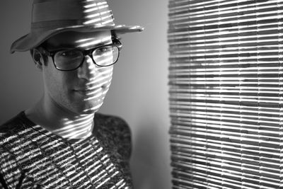 Portrait of young man wearing hat