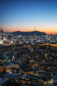 Sunset view over seoul city with view of n seoul tower. taken from changsindong, seoul, south korea