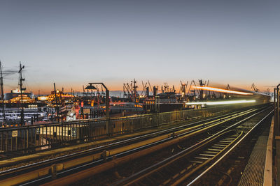 High angle view of railroad tracks against clear sky