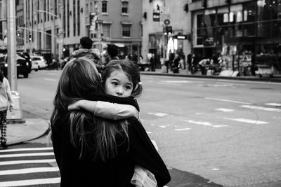 Cute girl on road in city