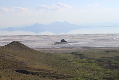 Scenic view of sea and mountains