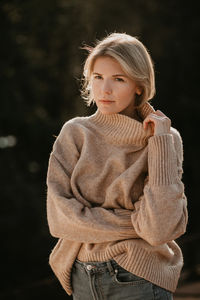 Portrait of woman standing outdoors