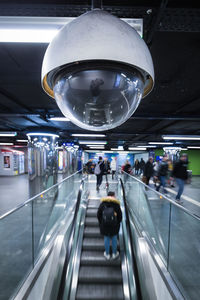 People on escalator