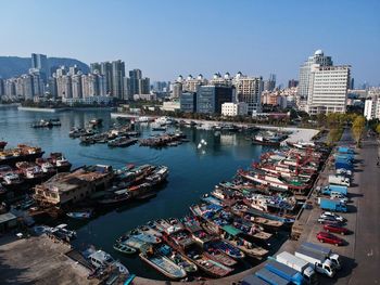 High angle view of shenzhen by sea against clear sky