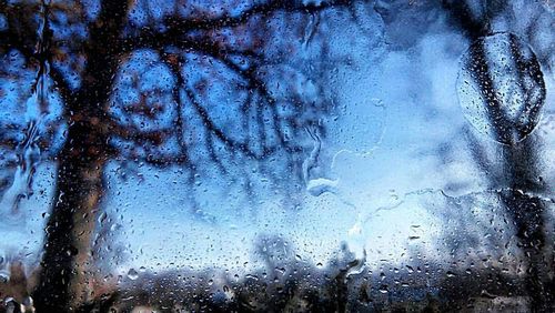 Close-up of water drops on glass