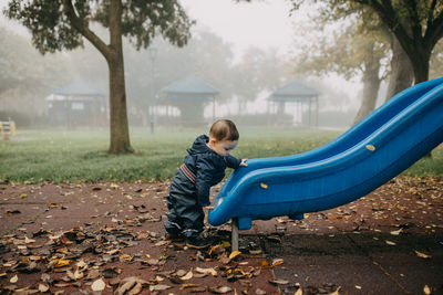 Boy playing in park