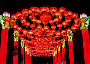 Illuminated lanterns hanging at night