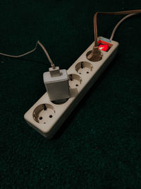 High angle view of telephone on table