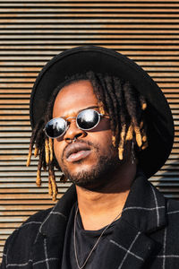 Portrait of young man wearing sunglasses