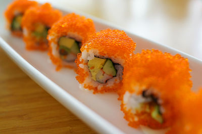 Close-up of sushi served in plate