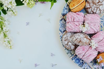 High angle view of pink petals on table