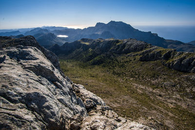 Scenic view of rocky mountains against clear sky