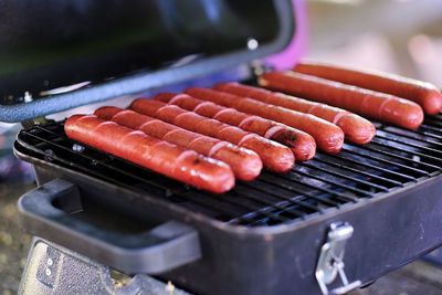 High angle view of meat on barbecue grill