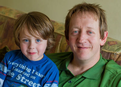 Portrait of smiling father and son