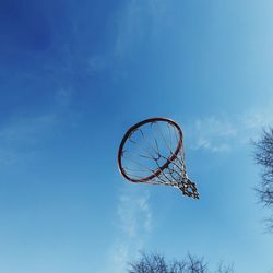 Low angle view of basketball hoop against sky