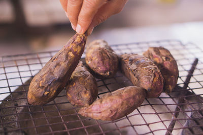 Close-up of meat on barbecue grill