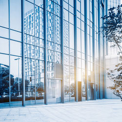 Modern building in city against sky