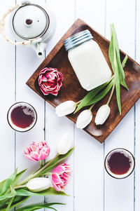 High angle view of pink roses on table