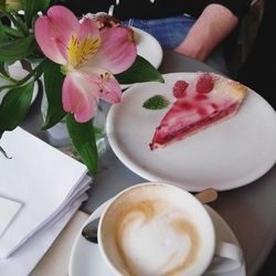 Close-up of pink flowers on table