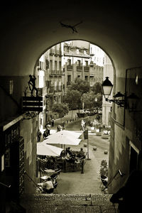 View of building seen through archway