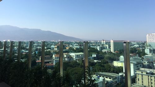 View of cityscape against clear sky