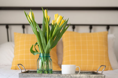 Close-up of vase on table at home