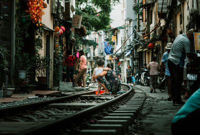 People walking on street in city