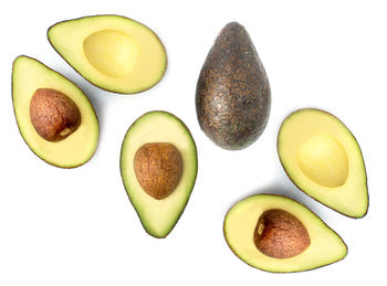 Close-up of fruits against white background