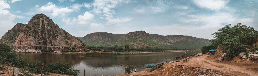 Panoramic view of rocks and mountains against sky