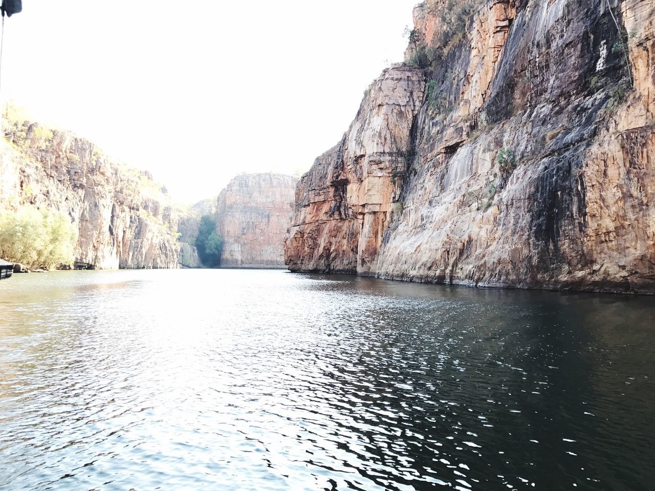 nature, scenics, rock - object, tranquility, rock formation, beauty in nature, no people, tranquil scene, day, mountain, waterfront, water, outdoors, sky, scenery