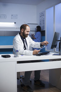 Female doctor working at clinic