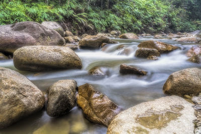 Stream flowing through rocks