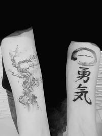 Close-up of mannequin against black background