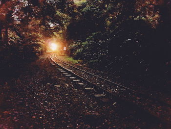 Railroad tracks at night