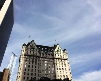 Low angle view of modern buildings against sky