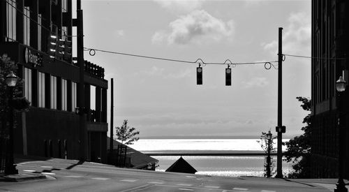 Street by building against sky