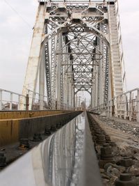 View of railroad bridge against sky