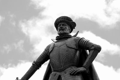 Low angle view of statue against sky