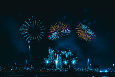 Firework display at night