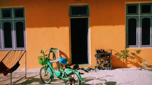 Bicycle parked outside house