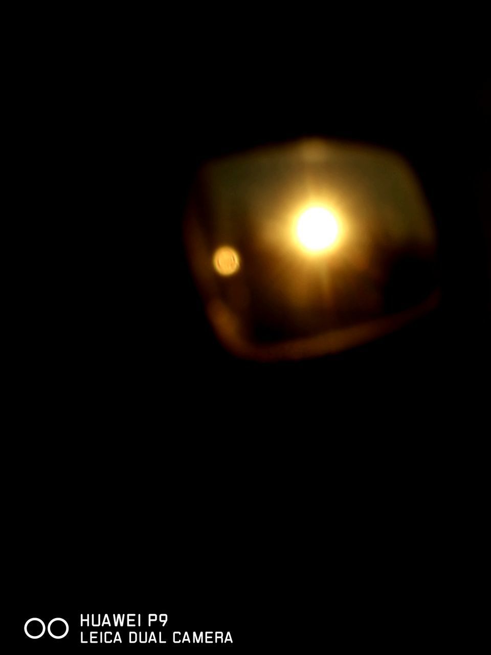 CLOSE-UP OF ILLUMINATED LIGHT BULB