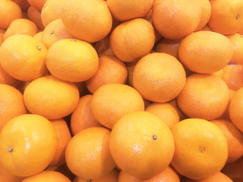 Full frame shot of oranges in market