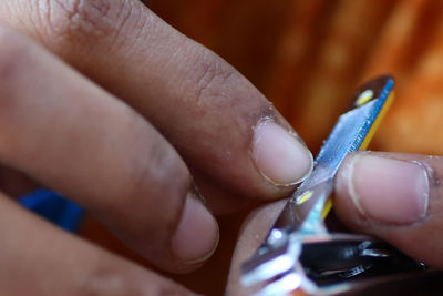 Close-up of woman holding hands